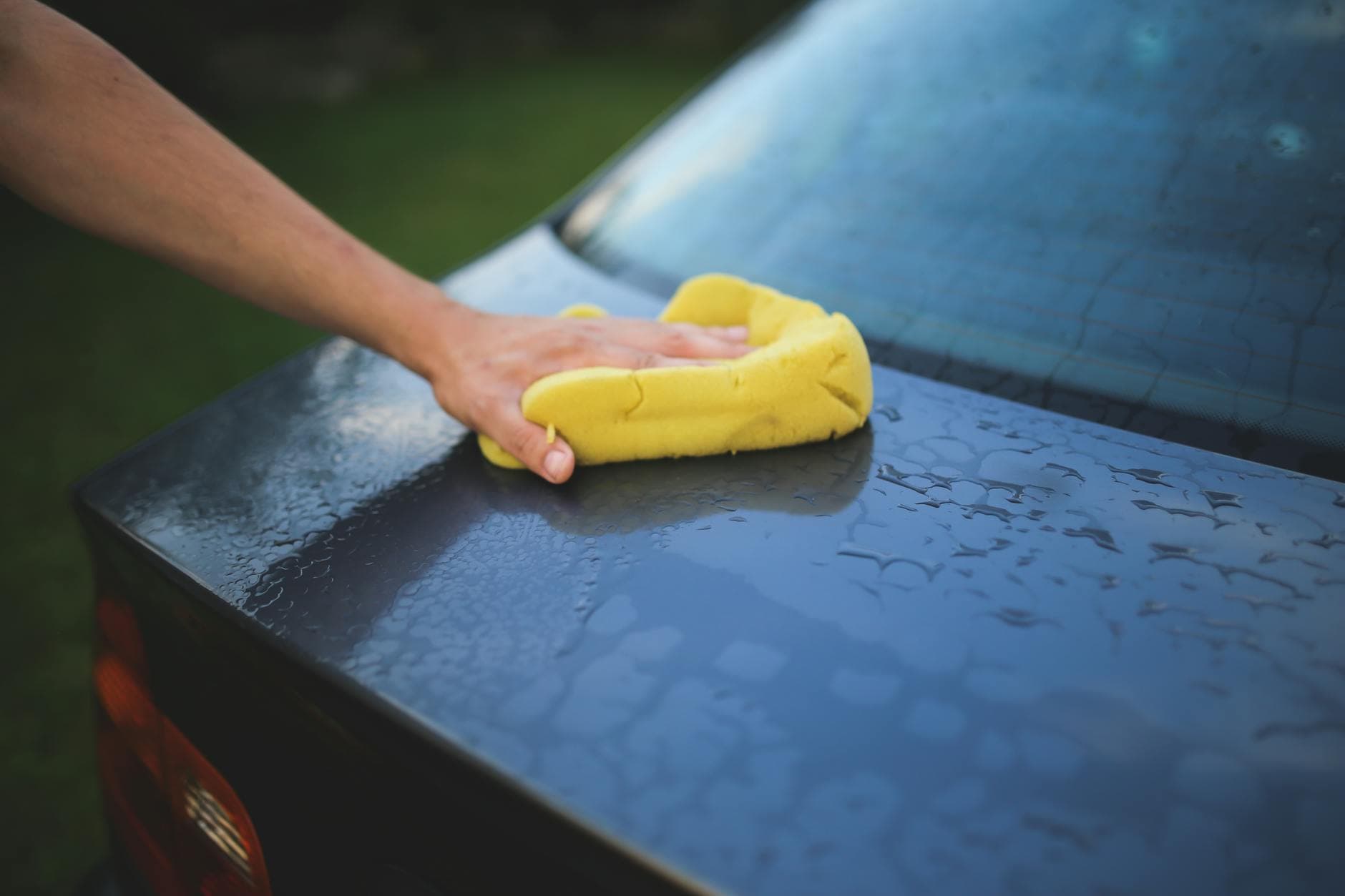 Glossy spotless car exterior after detailing